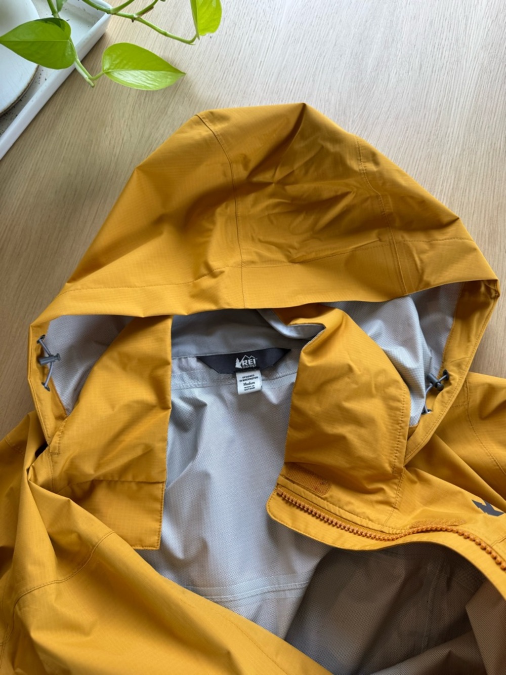 REI Women’s Mustard Yellow Hooded Rain Jacket - Picture 6 of 7
